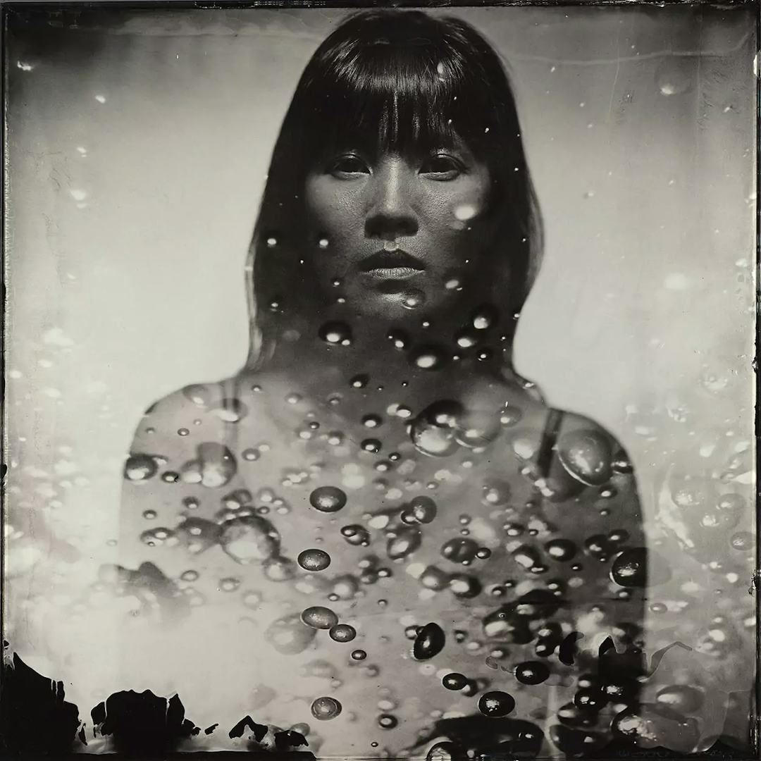 Collodion double exposure vietnamese woman and water.