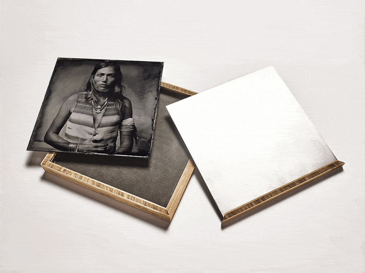 Boxed collodion portrait of woman in studio