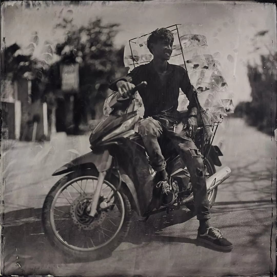 Collodion picture of Vietnamese man on his motorcycle.