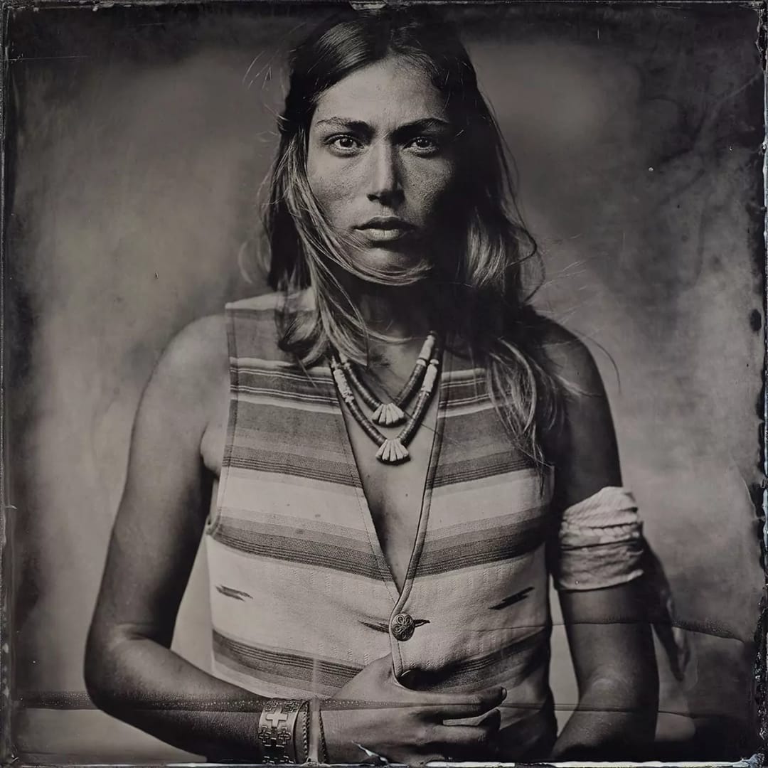 Collodion portrait of a woman with Navajo jewelry by Harpo.